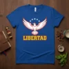 Libertad T-Shirt with a white eagle graphic and the word LIBERTAD in bold yellow and red text on a royal
