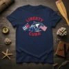Liberty Cuba T-Shirt design with a shark graphic between Cuban and American flags in red, white, and blue