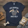 Life Happens Dogs Help text with a paw print and hands holding coffee and phone on a navy t-shirt