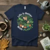 T-shirt with the phrase "Life is Better with PLANTS" encircling a sloth and cat among houseplants