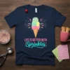 T-shirt with "LIFE IS BETTER WITH Sprinkles" text and a colorful ice cream cone graphic with sprinkles