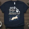 Life is Better with a Siamese Cat text and graphic design on a navy blue t-shirt, featuring a Siamese cat