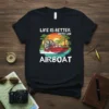 Life Is Better With An Airboat t-shirt design featuring a red airboat in water with trees and sunset graphic