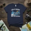 Navy t-shirt with "Life is better With AN AirBoat" text and a graphic of an airboat on water with trees