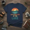 Life Is Better At The Lake t-shirt with a retro sunset graphic over mountains and water