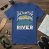 Life Is Better At The River t-shirt with graphic of a kayaker on a winding river at sunset