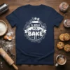 Life is What You Bake It quote with baking graphics on a navy t-shirt, perfect for bakers