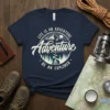 Life Is An Adventure Be An Explorer text with mountain and campfire graphic on navy t-shirt