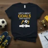 T-shirt featuring the quote "Life's About Goals (And Assists)" with a soccer ball and fist bump graphic
