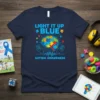 Light It Up Blue Autism Awareness t-shirt with puzzle brain graphic and hands
