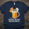 Like Beer You Can't Have Just One Cat quote on a navy t-shirt featuring cats in a beer mug graphic