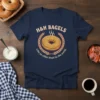 H&H Bagels t-shirt with the quote "Like no other bagel in the world." featuring a graphic of a bagel surrounded
