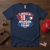 Navy t-shirt featuring "LINCOLN REAGAN TRUMP" in bold white text with red and blue accents, flanked by an elephant and