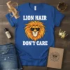 Lion Hair Don't Care text with a cool lion wearing sunglasses graphic on a royal blue t-shirt
