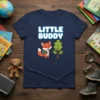 Little Buddy t-shirt with a cartoon fox wearing a backpack and holding a compass, next to a tree