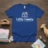 Blue t-shirt with "Little Family Clothing & More For Your Growing Family" text and a house with heart and sun