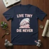 Navy t-shirt with "Live Tiny Die Never" text and a cute tardigrade graphic, symbolizing resilience and microscopic life