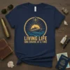 Living Life One Cruise At A Time t-shirt with a cruise ship, compass, and sun graphic