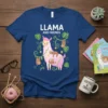 Llama And Friends t-shirt design with a white llama, pink accents, and hanging sloths, surrounded by green leaves and yellow