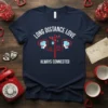 Navy t-shirt with "LONG DISTANCE LOVE ALWAYS CONNECTED" text and graphic of two heads connected by wires over a telephone