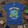 Blue t-shirt with "LOOKIN' FOR GAMES MEET PLAY SHOP LEVITTOWN PA" text and a colorful board game map graphic