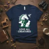 Love All Creatures t-shirt design featuring a horse, dog, cat, and hummingbird, with green intertwining loops and text