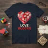 Navy blue t-shirt with "LOVE BLOCKS" text and a heart made of red and pink building blocks