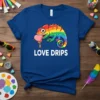 LOVE DRIPS T-Shirt with a rainbow chameleon holding a dripping heart, LGBTQ pride theme