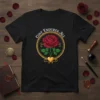 Black t-shirt featuring the quote "Love Endures All" above a red rose within a gold circle, with a gold heart