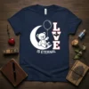 Love Is Eternal teddy bear sitting on moon holding balloon, white text, dark navy t-shirt design