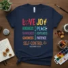 T-shirt design featuring the words LOVE JOY KINDNESS PEACE FAITHFULNESS GENTLENESS GOODNESS PATIENCE SELF-CONTROL and GALATIANS 5:22-23 in colorful typography