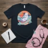 Love Nurse Life t-shirt design with a cute axolotl wearing a nurse hat and holding a heart, featuring retro stripes