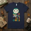 Navy blue t-shirt featuring a colorful cartoon owl with the text "Love OWLS" in a playful font