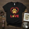 Black t-shirt with red heart and golden paw print, text LOVE with paw print as 'O', dog lover design