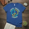 Blue t-shirt with "LOVE PEACE JESUS" text and a colorful peace symbol design