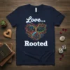 Love Rooted t-shirt with a colorful heart-shaped tree design and inspirational text
