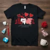 LOVE tooth design with red and black buffalo plaid and stripes, surrounded by red hearts, on a black t-shirt