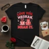 Love You, Meghan, Mean It. text design with a coffee cup and gifts on a black t-shirt