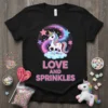 Black t-shirt with "Love and Sprinkles" text and a cute unicorn on a rainbow cloud, surrounded by stars