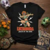 Luchadora Queen of the Ring text with a female wrestler graphic on a black t-shirt