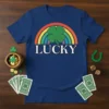 Navy blue t-shirt with the word "LUCKY" in white text under a rainbow and a green four-leaf clover