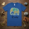 Blue t-shirt featuring a decorative elephant design and the word "Lucky" below it