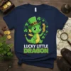 A cute green dragon wearing a leprechaun hat and holding gold coins, with text "Lucky Little Dragon" below