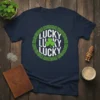 Navy blue t-shirt with "Lucky Lucky Lucky" text and a shamrock inside a green Celtic knot design