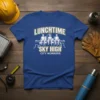 Lunchtime Sky High City Workers T-Shirt featuring construction workers on a beam with city skyline graphic