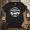 Campbeltown Scotland t-shirt design with "Made in Campbeltown Ah'll Remember Ye Est. 1660" text, lighthouse, and sailing ship graphic