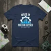Navy blue t-shirt featuring "MADE IN MILTON KEYNES *WITH QUALITY PARTS" text and a cityscape graphic within a gear design