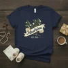 Madrina EST. 2025 text on a navy t-shirt with floral banner graphic