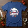Maestro Chef T-Shirt featuring a chef's hat, whisk, knife, and flames, with the word "Maestro" in bold lettering
