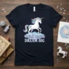 T-shirt with "MAGICAL CREATURE DREAM BIG" text and a white unicorn with a rainbow mane standing on clouds